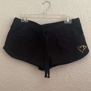 Woman’s shorts, size large, color black, cotton & polyester